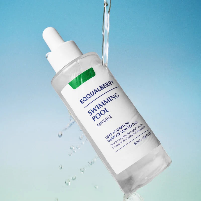 Skincare ampoule bottle labeled 'Equalberry Swimming Pool' with water droplets on a blue gradient background