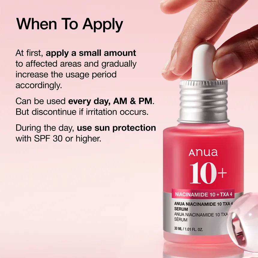Pink skincare serum bottle with dropper on a pink background, displaying usage instructions.