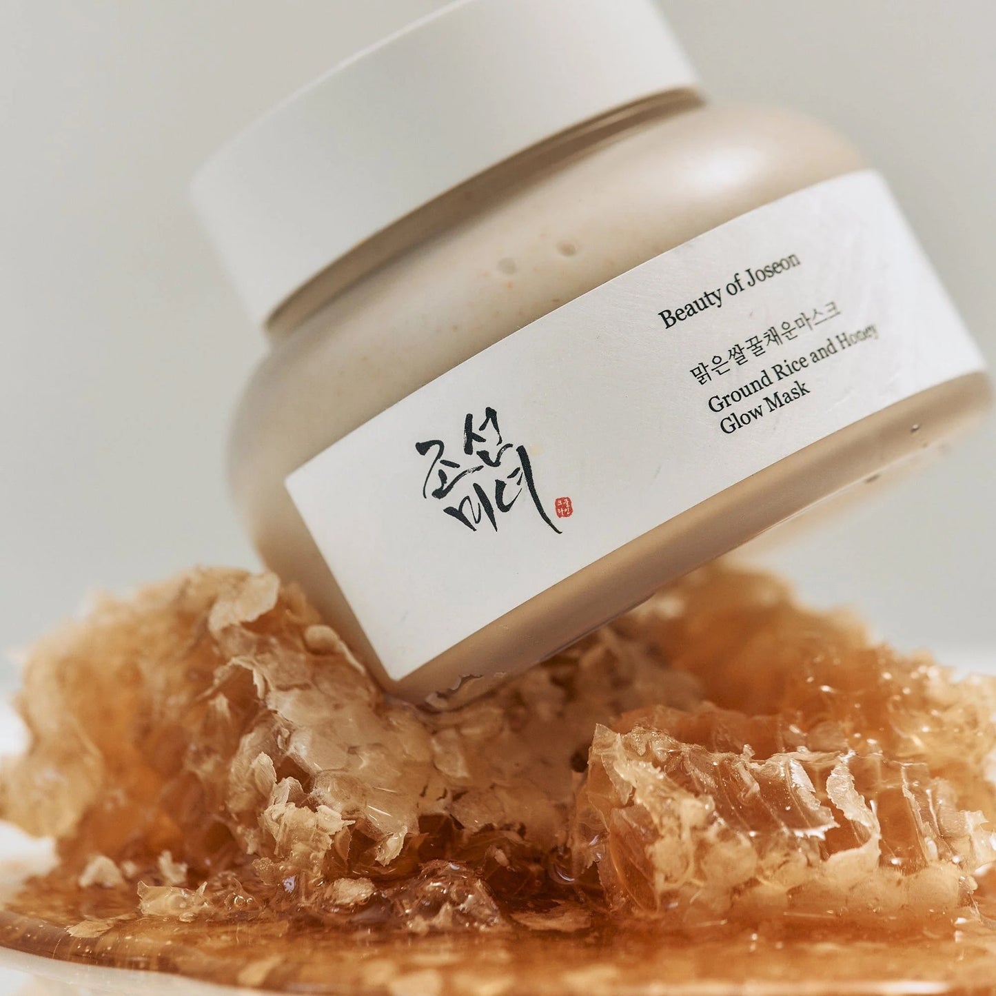 Beauty of Joseon Ground Rice and Honey Glow Mask with honeycomb on a white background