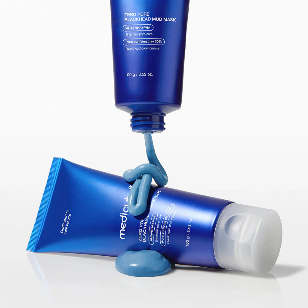 Blue skincare product with packaging on a white background