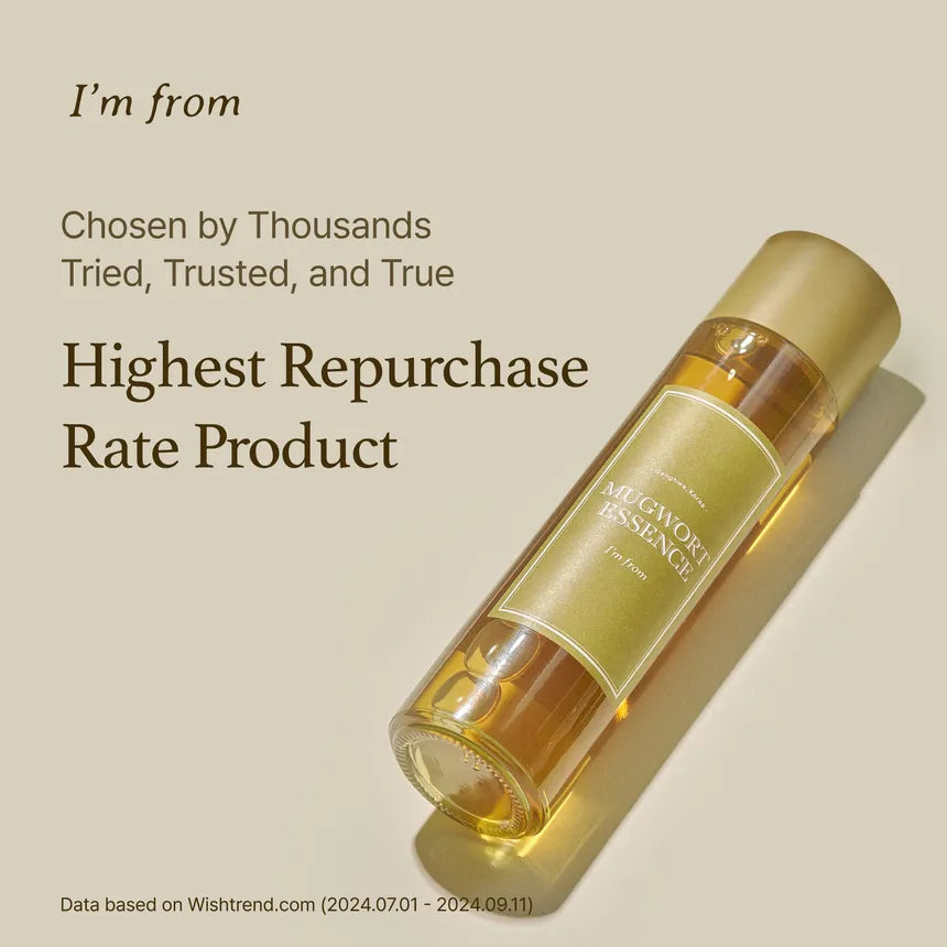 Skincare bottle with text about being a highest repurchase rate product on a beige background