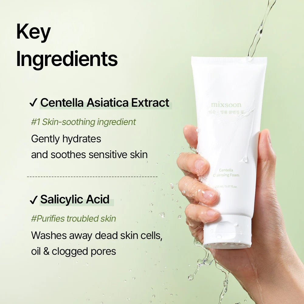 Hand holding a skincare product with key ingredients listed on a light green background