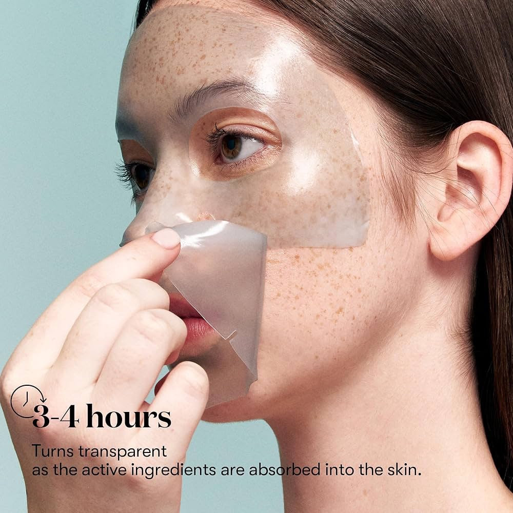 Woman applying a face mask with text indicating absorption time.