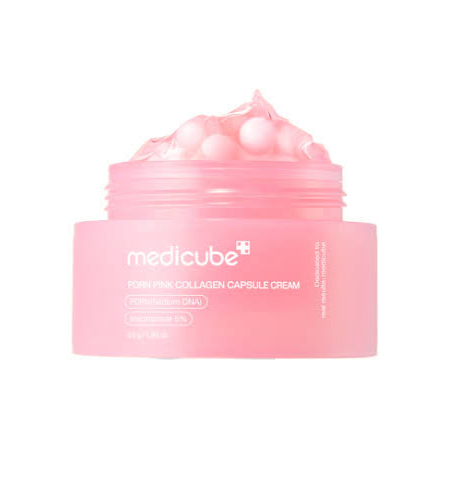 Pink jar of Medicube cream with visible brand name on a white background
