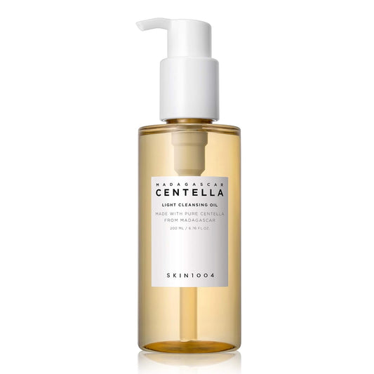 Bottle of Madagascar Centella light cleansing oil with a white pump on a white background