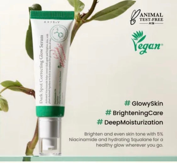 Tube of skincare serum with green leaves on a light background, featuring 'Animal Test-Free' and 'Vegan' logos.