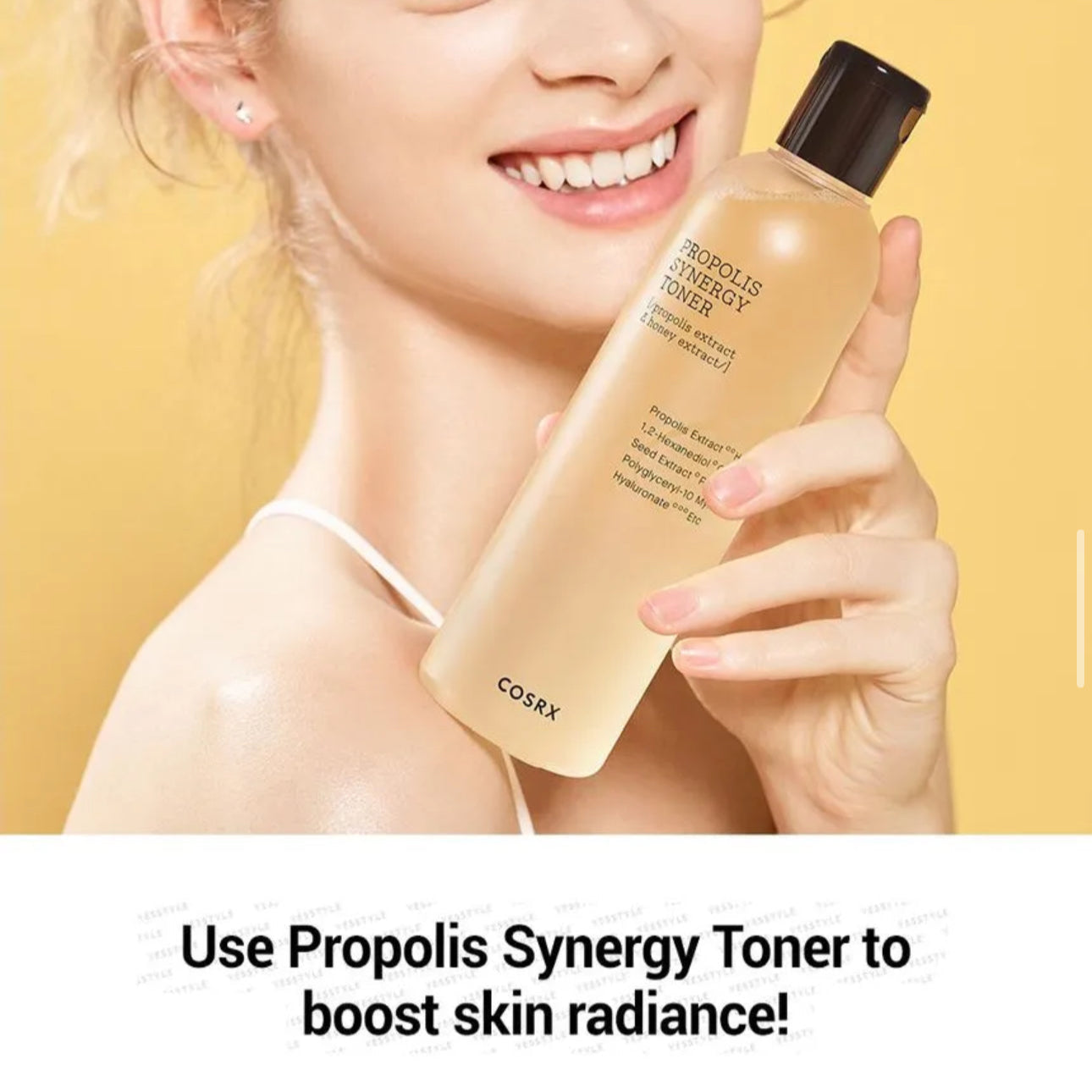 Person holding a COSRX Propolis Synergy Toner bottle against a yellow background
