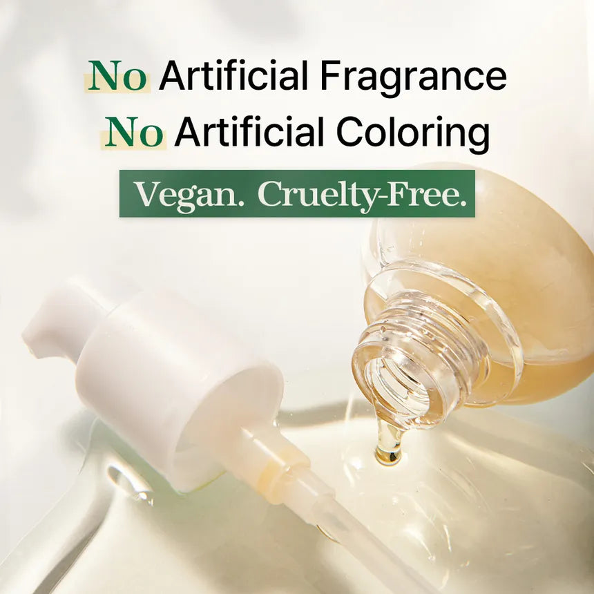 Bottle of skincare product with text indicating no artificial fragrance or coloring, vegan, and cruelty-free.