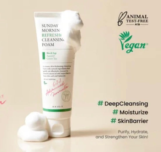 Cleansing foam tube with branding and product features on a beige background