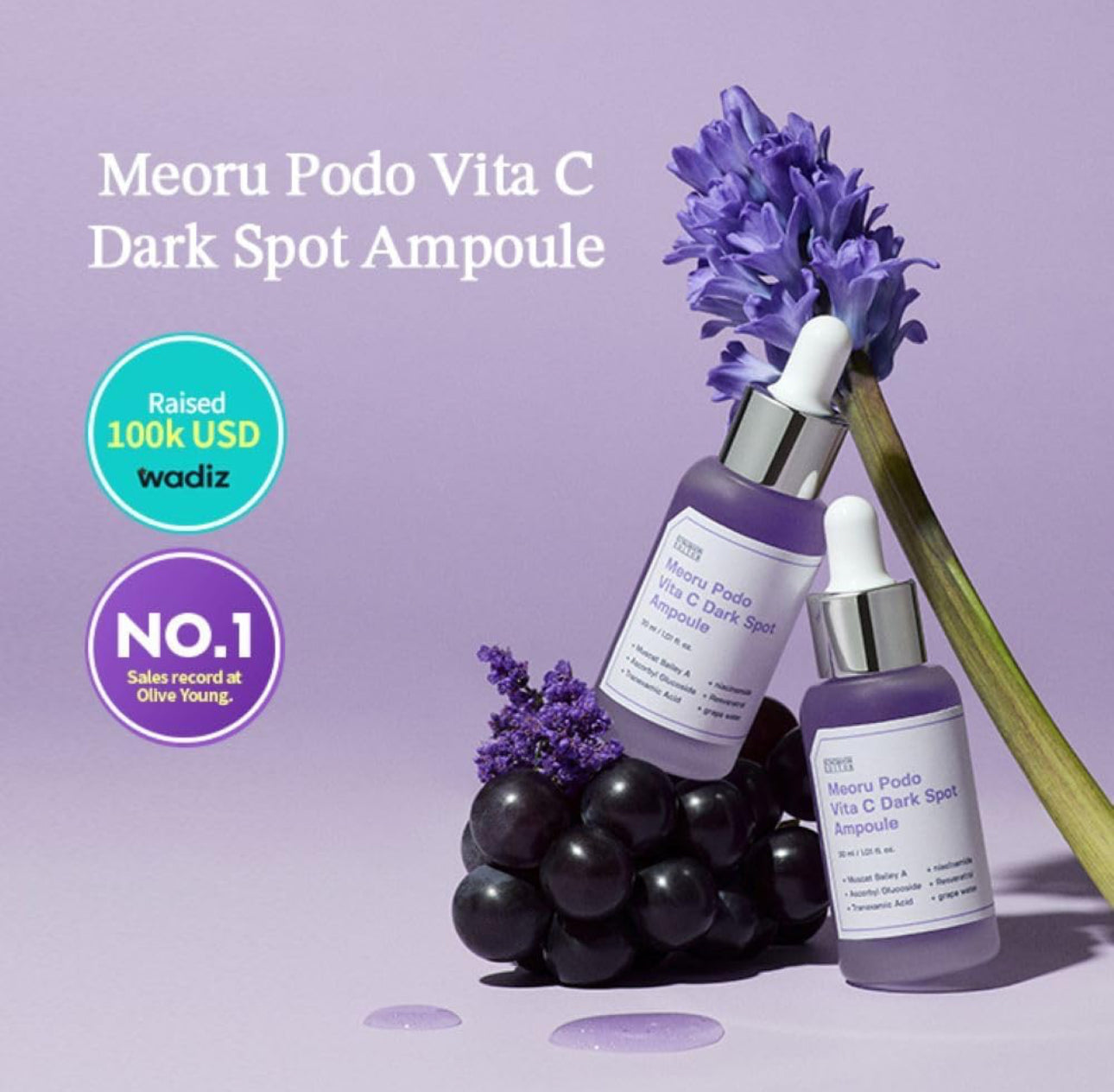 Meoru Podo Vita C Dark Spot Ampoule with grapes and lavender on a purple background
