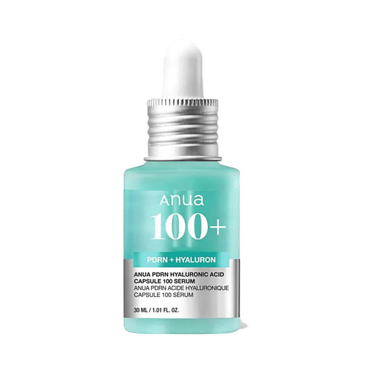 Anua 100+ serum bottle with dropper on a white background
