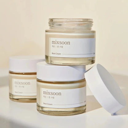Three jars of 'mixsoon' cream on a light background
