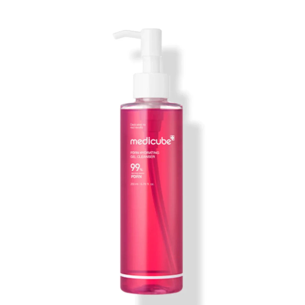 Pink bottle with pump dispenser labeled 'medicube' on a white background
