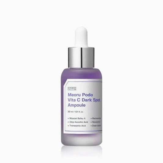 Skincare bottle labeled 'Meoru Podo Vita C Dark Spot Ampoule' on a white background