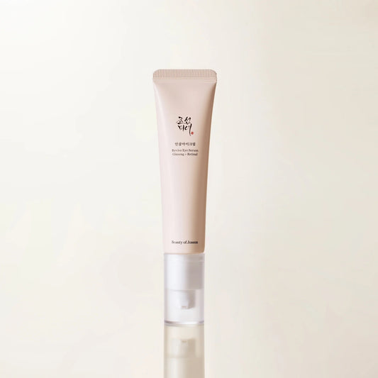 Skincare tube with visible brand name on a light beige background
