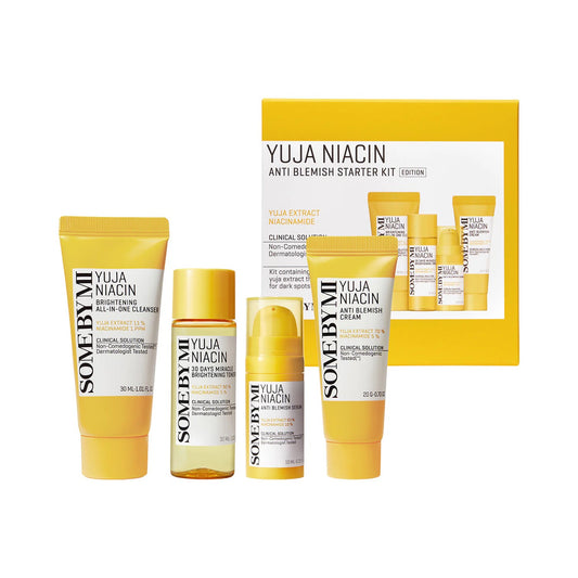 Skincare product set with yellow and white packaging featuring 'SOME BY MI' on a white background.