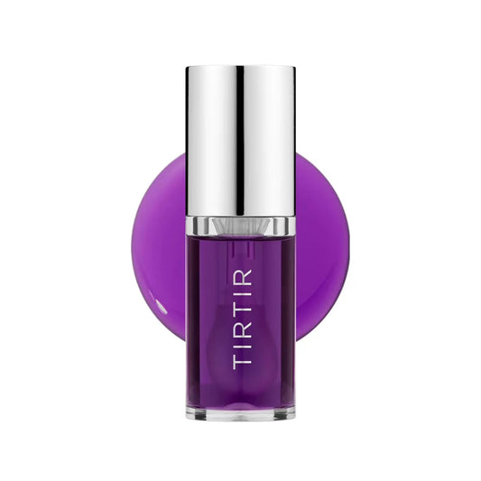 Purple lipstick with silver cap on a white background