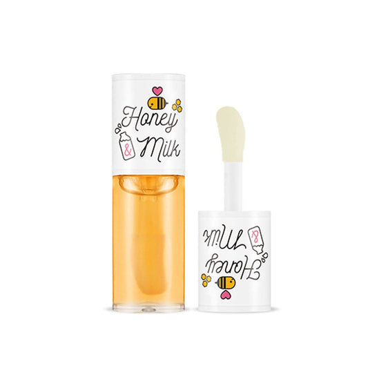 Two bottles labeled 'Honey Milk' with a white background