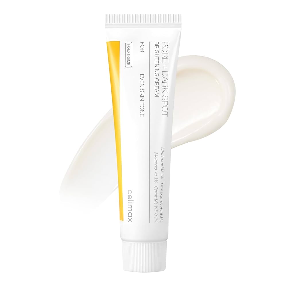 Tube of Pore + Dark Spot Cream with applicator on a white background