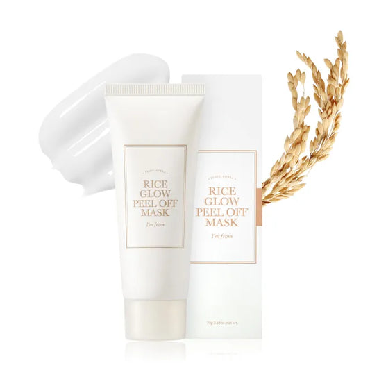 Two tubes of 'Rice Glow Peel Off Mask' with a gold leaf on a white background