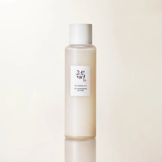 Skincare bottle with a white label on a light beige background