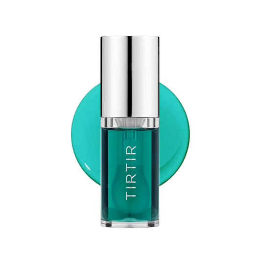 Teal bottle with silver cap on a white background