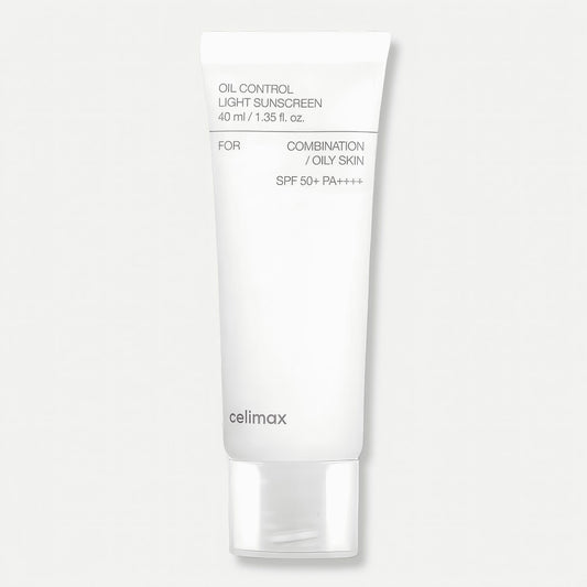 White sunscreen tube labeled 'celimax' on a light gray background