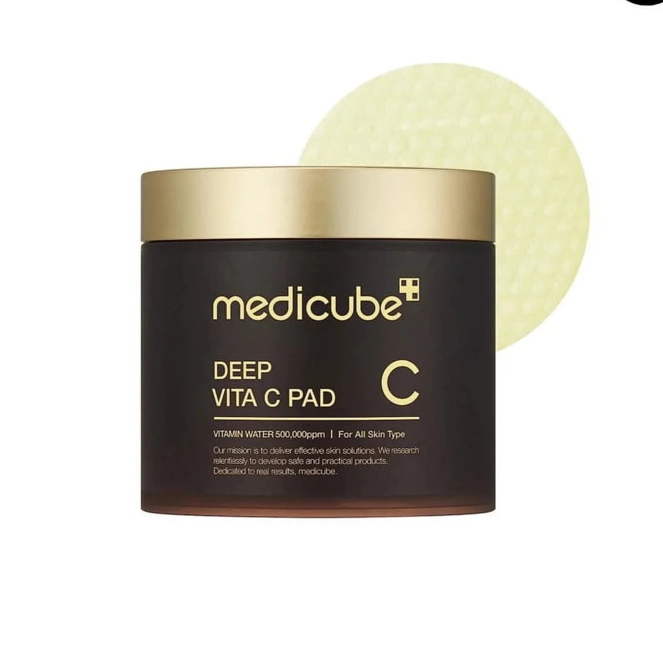 Medicube Deep Vita C Pad with a gold lid on a white background