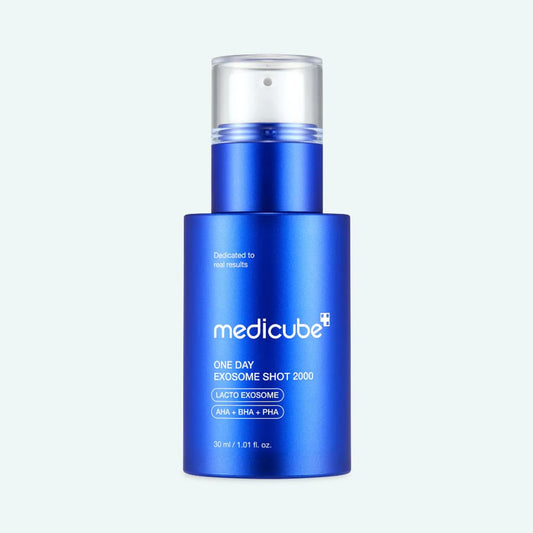 Blue skincare bottle with 'medicube' branding on a light gray background