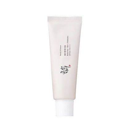 White tube of skincare product on a white background