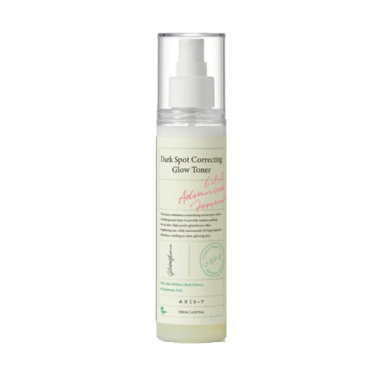 Bottle of dark spot correcting glow toner on a white background