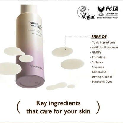 Cosmetic bottle with 'PETA Approved' and 'Vegan' labels, highlighting key ingredients for skin care.